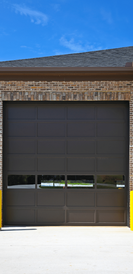 Brown panel lift garage door