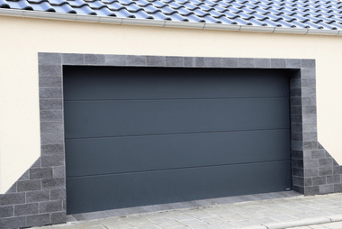 Sectional or panel lift garage door